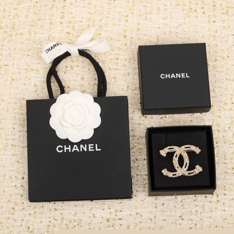 Ch*el brooches